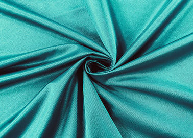ผ้าแปนเด็กซ์ไนลอน 84% ยืดหยุ่นสำหรับชุดว่ายน้ำดอกนกยูงสีเขียว 210GSM